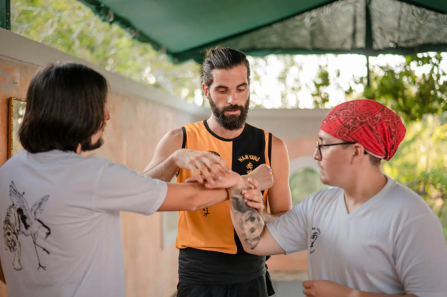 Thomas giving personal instruction to a student during training