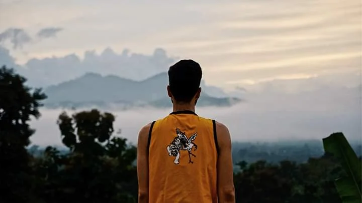 A young Thomas overlooking the mountains of Pai, Thailand