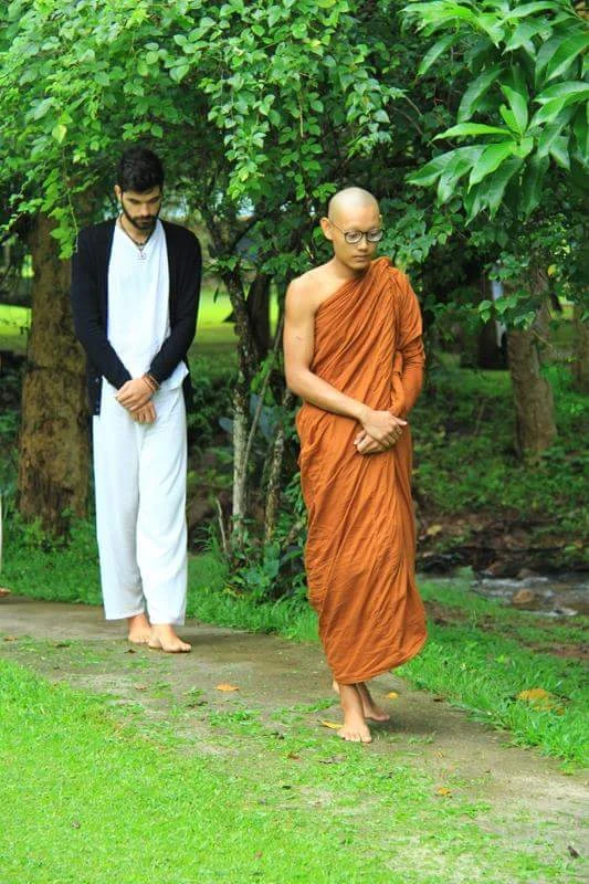 Walking meditation with a monk at Wat Pa Tam Wua monastery