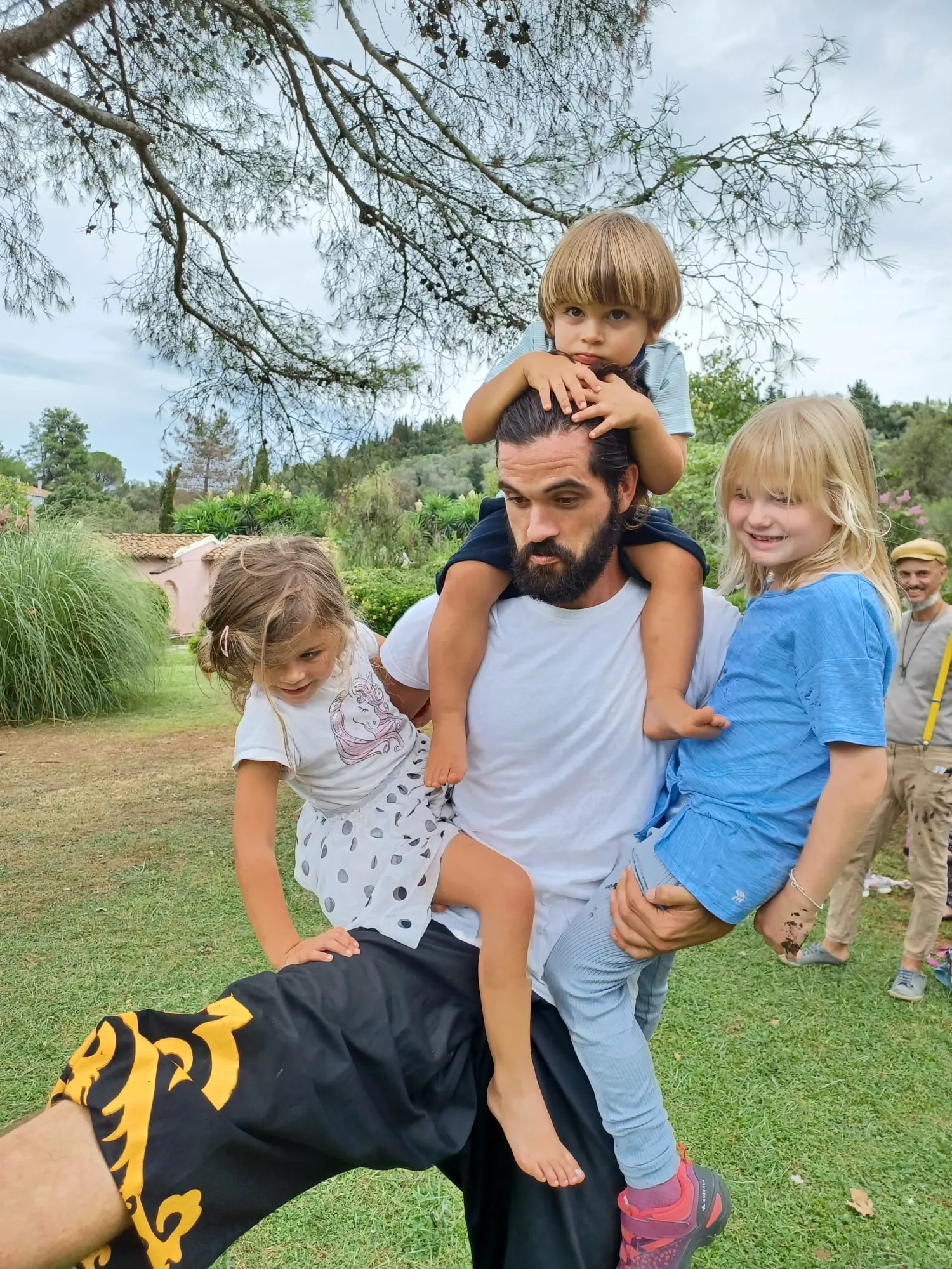 Thomas interacting naturally with local children during a class