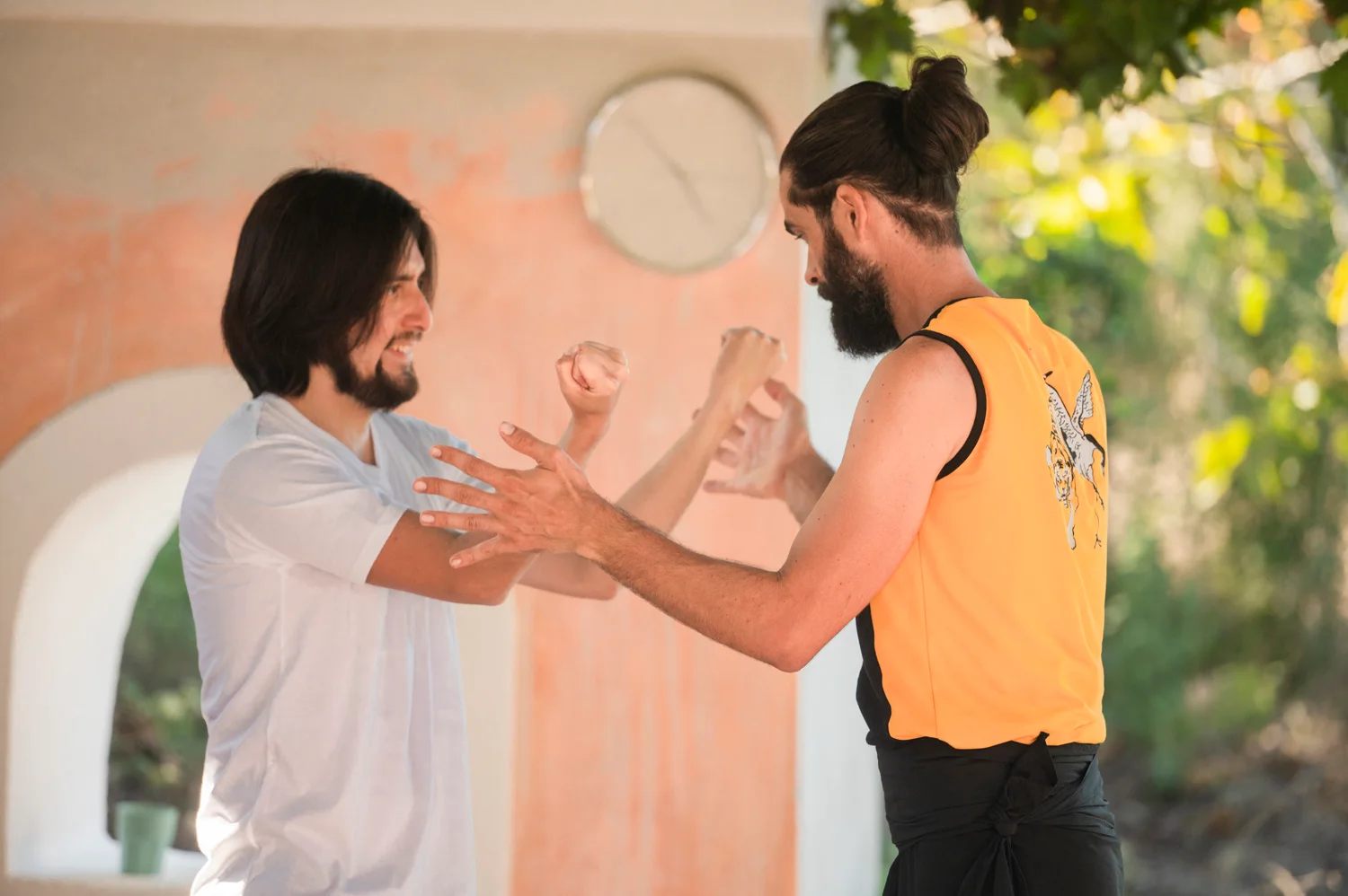 Thomas working directly with a student during partner practice